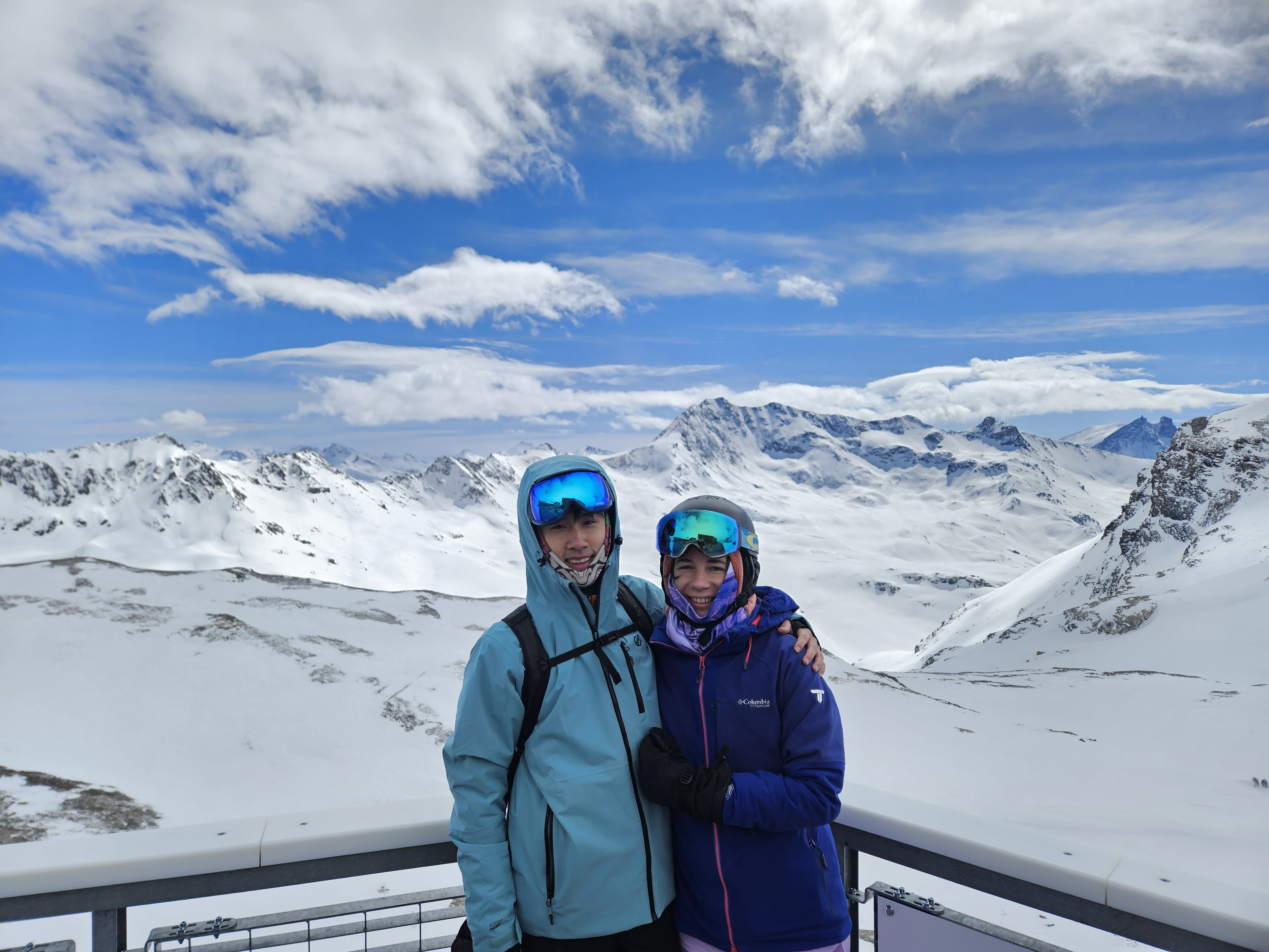 Nathalie and Kevin skiing in the mountains